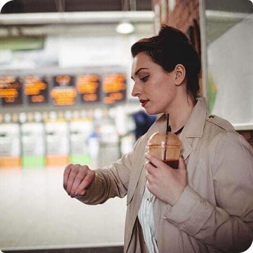 Woman checking the time on her watch